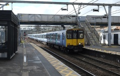 315820 arrives at Ilford with a Shenfield service
